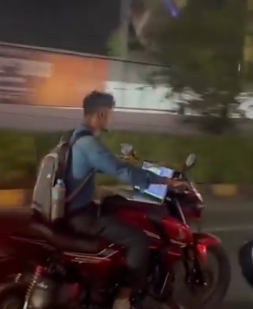 VC Sajjanar Warns Youth Against Dangerous Laptop-Stunt While Riding a Bike