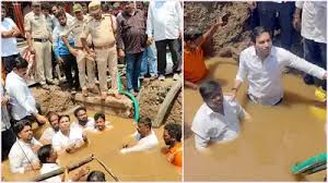 YSRCP District President Devineni Avinash Staged Unique Protest Inside a Pit Over Drinking Water Crisis…